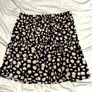Perfect skirt for summer. Sits Little above midthigh & I’m 5’9 for perspective.